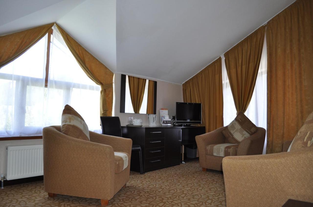 Kapriz Karakol Hotel Phòng bức ảnh